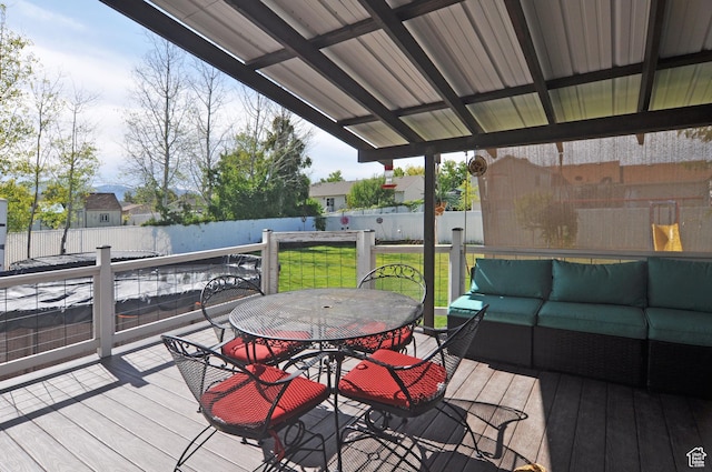 2857 W 2250 N, Clinton, UT 84015 - deck with outdoor lounge area, a fenced backyard, and outdoor dining area