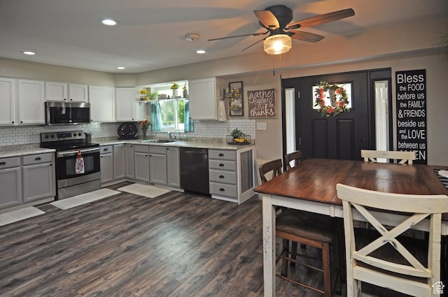2857 W 2250 N, Clinton, UT 84015 - kitchen featuring stainless steel appliances, gray cabinets, light countertops, tasteful backsplash, and recessed lighting