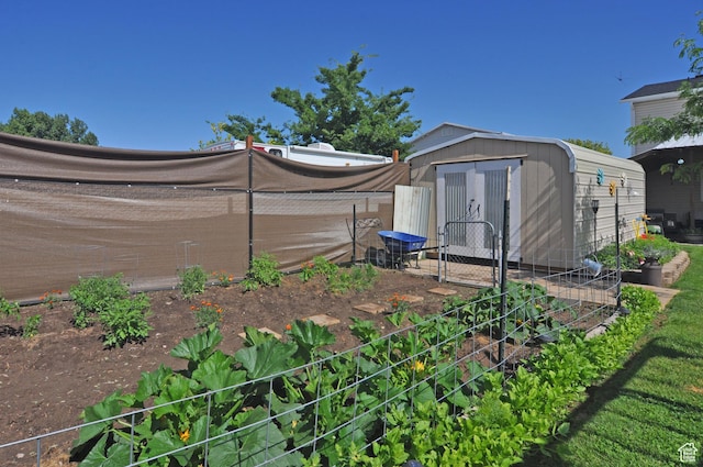 2857 W 2250 N, Clinton, UT 84015 - view of yard featuring a storage unit and a garden