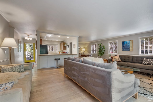 2442 Lily Langtry Ct, Park City, UT 84060 - living area with ornamental molding, light wood-style flooring, plenty of natural light, and recessed lighting