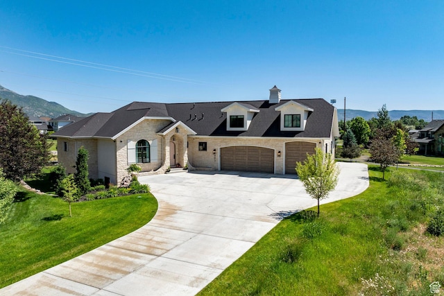 905 S Coldwater Way, Midway, UT 84049 - french country home featuring stone siding, a garage, concrete driveway, and a front lawn
