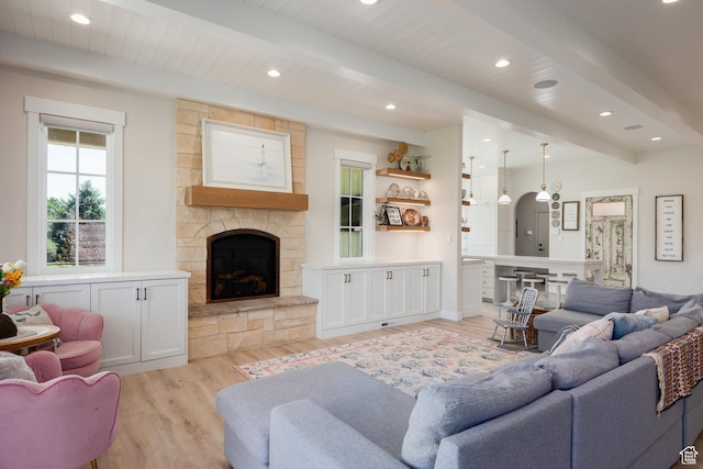 905 S Coldwater Way, Midway, UT 84049 - living area featuring beamed ceiling, light wood-style flooring, a stone fireplace, and recessed lighting