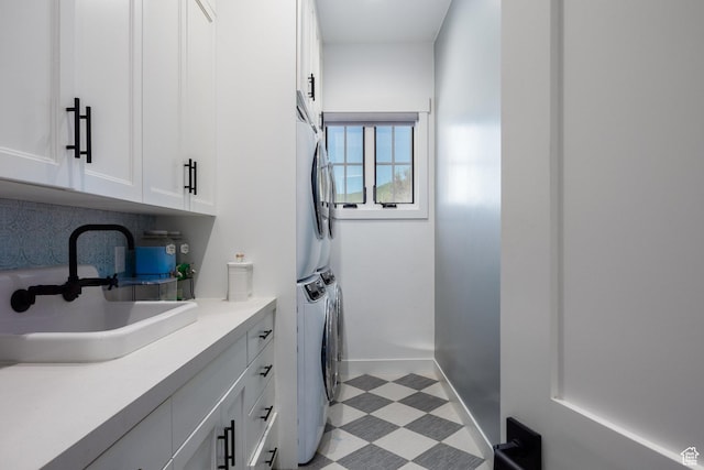 905 S Coldwater Way, Midway, UT 84049 - washroom with cabinet space, stacked washer / drying machine, and light flooring