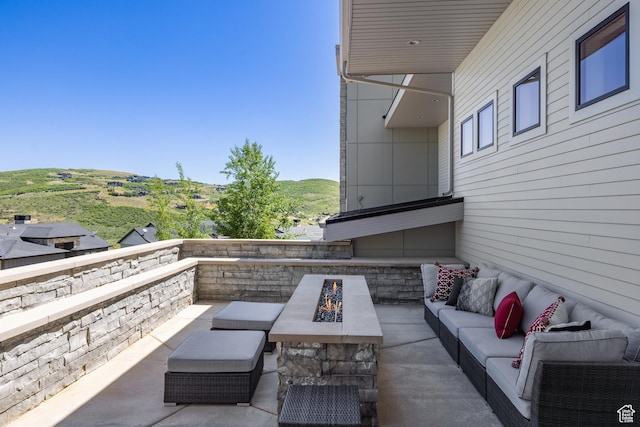 13202 N Alexis Dr, Heber City, UT 84036 - view of patio / terrace featuring an outdoor living space with a fire pit and a mountain view