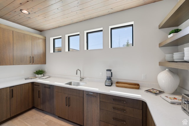 13202 N Alexis Dr, Heber City, UT 84036 - kitchen featuring light countertops, open shelves, light wood-style floors, wooden ceiling, and dark brown cabinetry