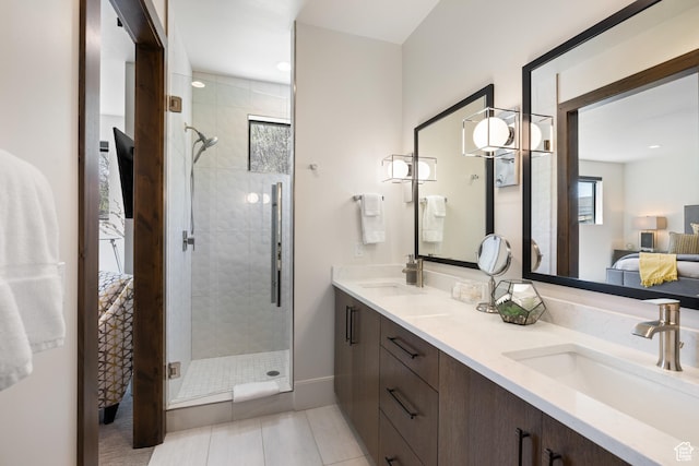 13202 N Alexis Dr, Heber City, UT 84036 - ensuite bathroom with double vanity, a stall shower, and tile patterned floors