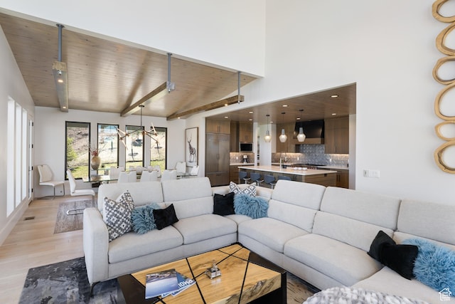 13202 N Alexis Dr, Heber City, UT 84036 - living room featuring light wood-style floors, high vaulted ceiling, and recessed lighting