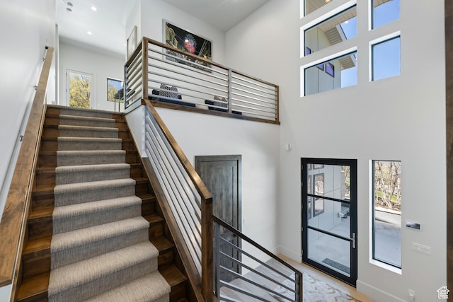 13202 N Alexis Dr, Heber City, UT 84036 - staircase with a towering ceiling and recessed lighting