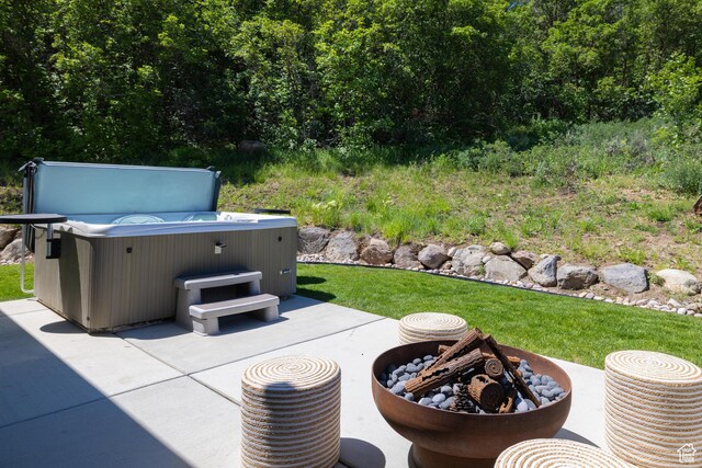 13202 N Alexis Dr, Heber City, UT 84036 - view of patio / terrace with a fire pit and a hot tub