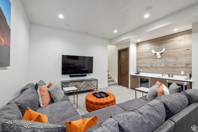 13202 N Alexis Dr, Heber City, UT 84036 - living area featuring wooden walls, stairway, light colored carpet, recessed lighting, and wet bar