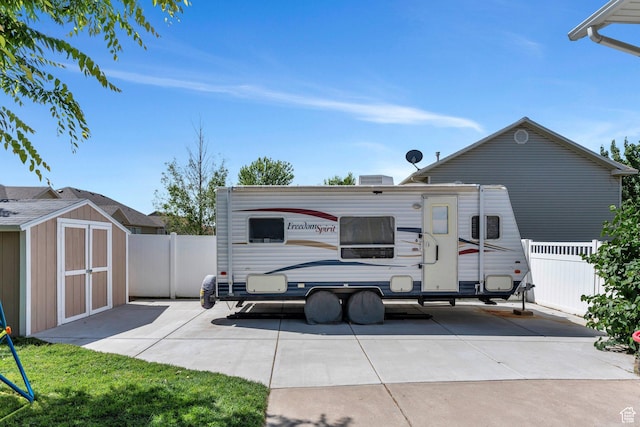 1666 N 160 W, Layton, UT 84041 - back of house with a storage unit and a patio
