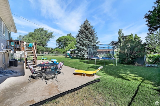 604 W 1750 N, Clinton, UT 84015 - view of yard with a trampoline, a playground, a patio area, and stairs