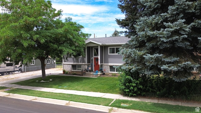 604 W 1750 N, Clinton, UT 84015 - view of front of home featuring a front yard and brick siding