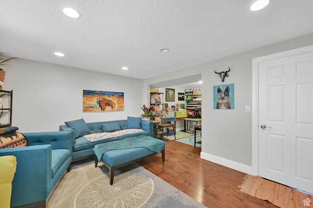 604 W 1750 N, Clinton, UT 84015 - living area with wood finished floors, recessed lighting, and a textured ceiling