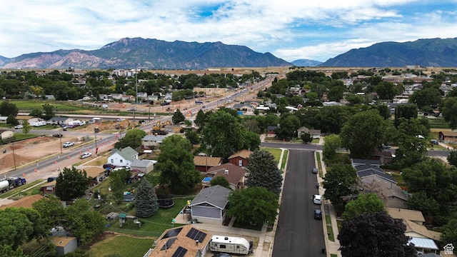 604 W 1750 N, Clinton, UT 84015 - aerial overview of property's location featuring mountains and nearby suburban area