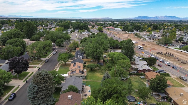 604 W 1750 N, Clinton, UT 84015 - aerial view of property and surrounding area featuring nearby suburban area and mountains