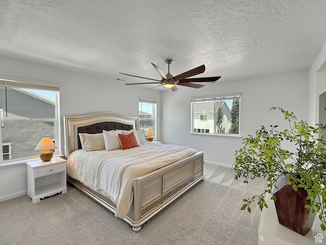 998 W 850 S, Springville, UT 84663 - bedroom featuring light carpet, a textured ceiling, and a ceiling fan