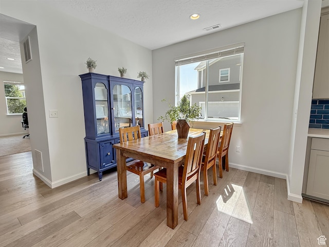 998 W 850 S, Springville, UT 84663 - dining room with light wood-type flooring, healthy amount of natural light, recessed lighting, and a textured ceiling