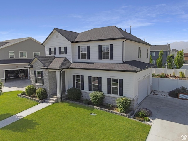 998 W 850 S, Springville, UT 84663 - traditional-style home featuring an attached garage, concrete driveway, a shingled roof, and stone siding