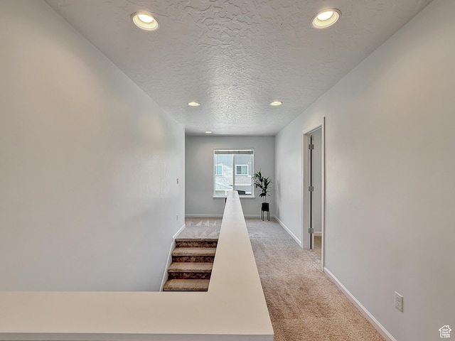 998 W 850 S, Springville, UT 84663 - hall featuring light carpet, recessed lighting, a textured ceiling, and stairway