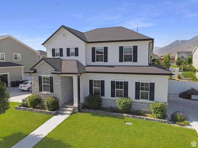 998 W 850 S, Springville, UT 84663 - view of front of house with stone siding, a shingled roof, and a mountain view