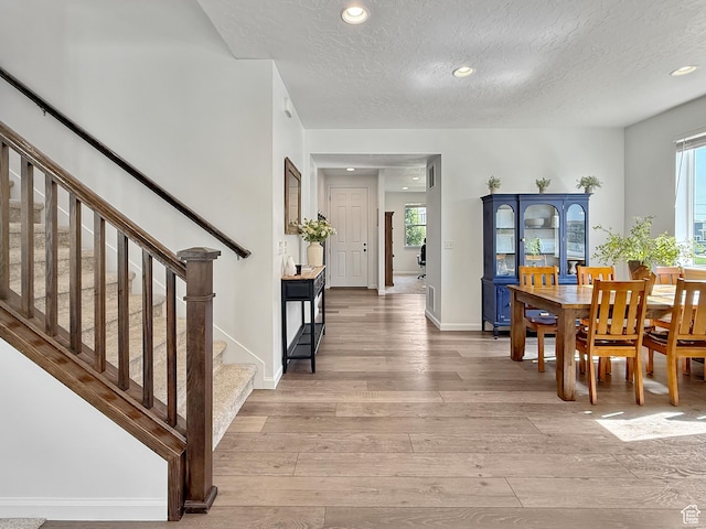 998 W 850 S, Springville, UT 84663 - dining area with stairway, light wood-style floors, a textured ceiling, and recessed lighting