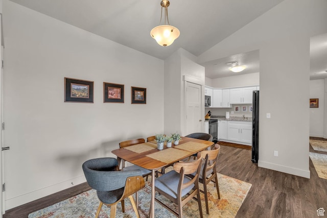 1043 S 500 E Unit G304, Heber City, UT 84032 - dining room featuring vaulted ceiling and dark wood finished floors