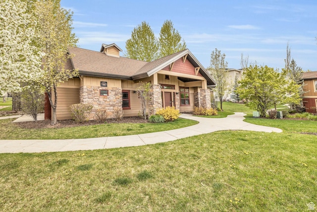 1043 S 500 E Unit G304, Heber City, UT 84032 - craftsman inspired home featuring stone siding, a front lawn, board and batten siding, and roof with shingles