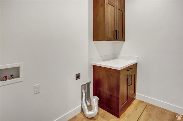 1978 N 840 E, North Ogden, UT 84414 - laundry room featuring hookup for an electric dryer, cabinet space, light wood-type flooring, and hookup for a washing machine