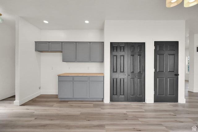 3482 E Kennekuk Cir, Eagle Mountain, UT 84005 - kitchen featuring gray cabinetry, light wood-style floors, recessed lighting, and butcher block countertops