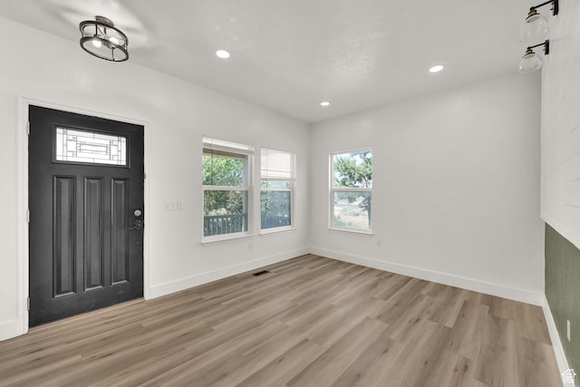 3482 E Kennekuk Cir, Eagle Mountain, UT 84005 - entryway with light wood-style flooring and recessed lighting