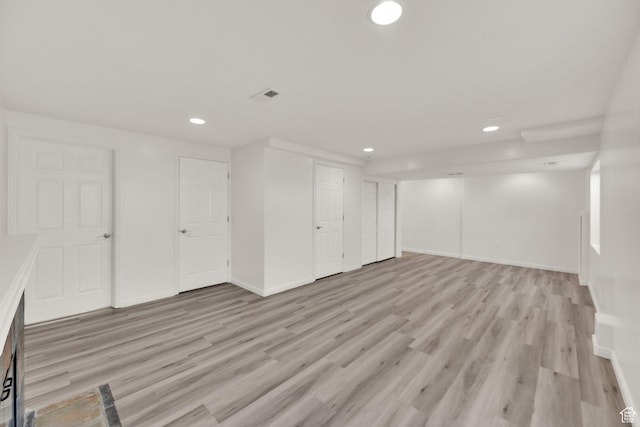 3482 E Kennekuk Cir, Eagle Mountain, UT 84005 - finished basement featuring recessed lighting and light wood-style flooring