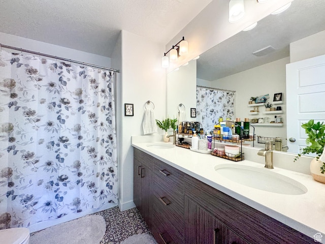 4721 W Talavara Way S, Kearns, UT 84118 - bathroom with double vanity, a shower with shower curtain, and a textured ceiling