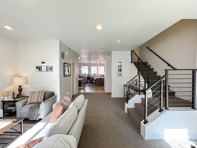 4721 W Talavara Way S, Kearns, UT 84118 - living area with carpet, stairway, and recessed lighting