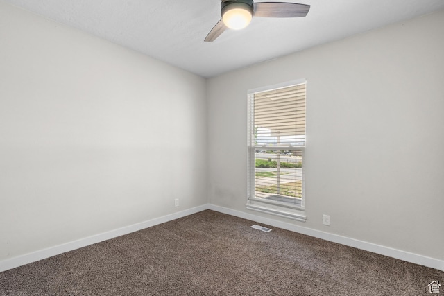 2234 W 300 N, West Point, UT 84015 - spare room featuring dark carpet and ceiling fan