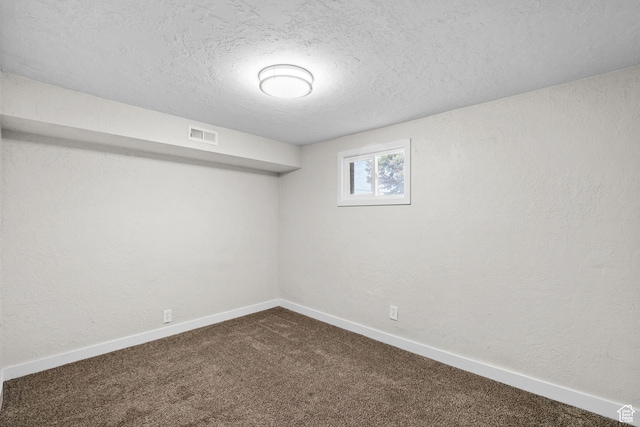 2234 W 300 N, West Point, UT 84015 - basement featuring dark carpet and a textured ceiling
