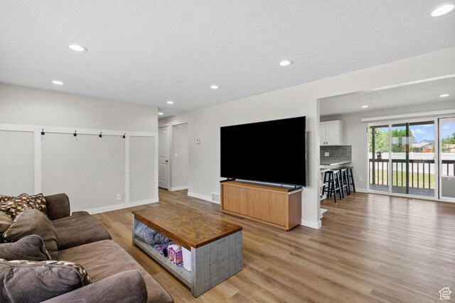 2234 W 300 N, West Point, UT 84015 - living room featuring light wood-style floors and recessed lighting