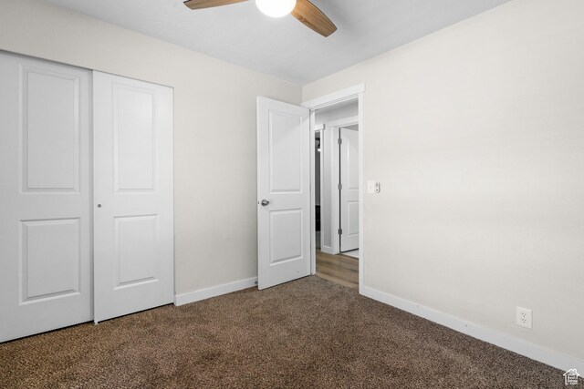 2234 W 300 N, West Point, UT 84015 - unfurnished bedroom with carpet, a closet, and a ceiling fan