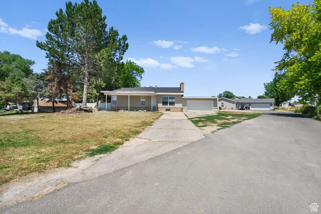 2234 W 300 N, West Point, UT 84015 - ranch-style home featuring a front yard, a garage, driveway, and a chimney