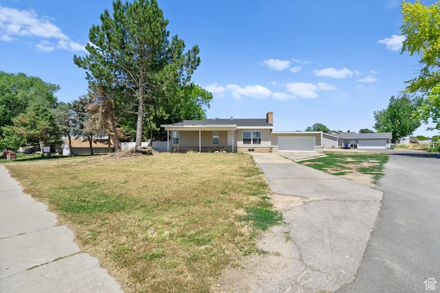 2234 W 300 N, West Point, UT 84015 - ranch-style house featuring a front yard, driveway, and a chimney