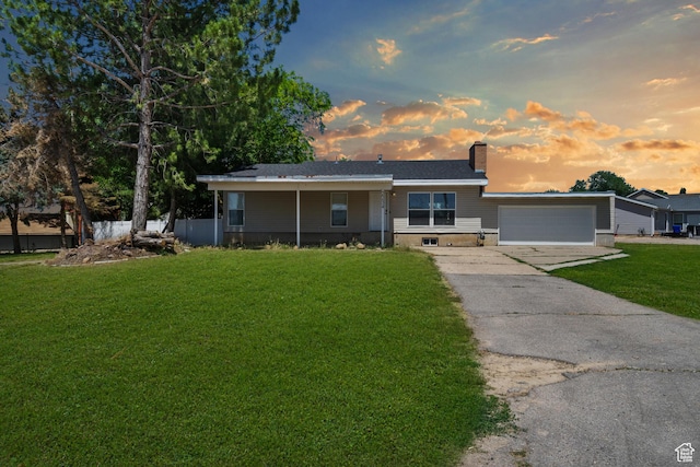 2234 W 300 N, West Point, UT 84015 - single story home featuring a front lawn, a chimney, concrete driveway, and a garage