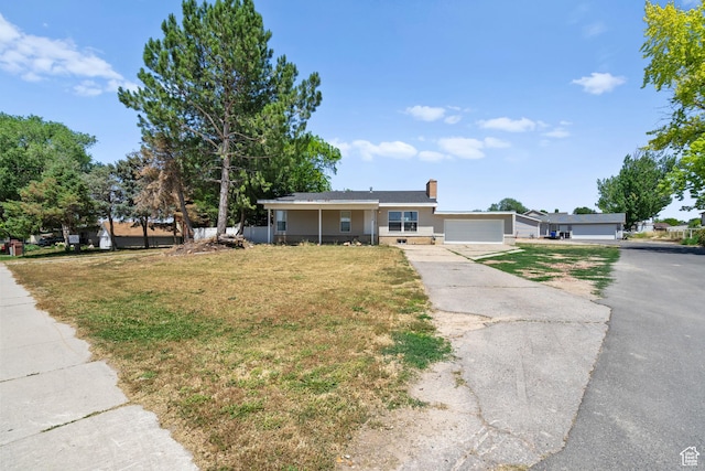 2234 W 300 N, West Point, UT 84015 - ranch-style home featuring a front lawn, driveway, a chimney, and a garage