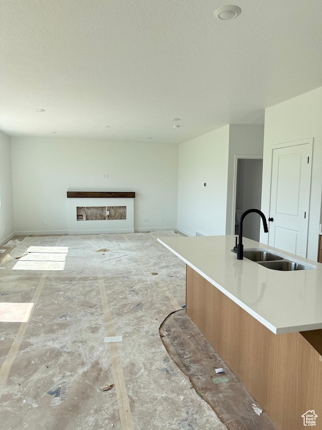 118 N 825 W, Clearfield, UT 84015 - unfurnished living room with a sink and a textured ceiling
