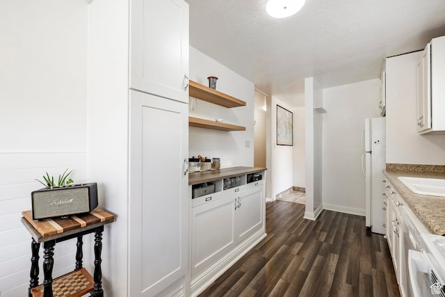 1795 S 50 W, Bountiful, UT 84010 - kitchen featuring freestanding refrigerator, dark wood-style floors, open shelves, white cabinetry, and light countertops