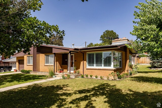1795 S 50 W, Bountiful, UT 84010 - ranch-style house with brick siding and a chimney