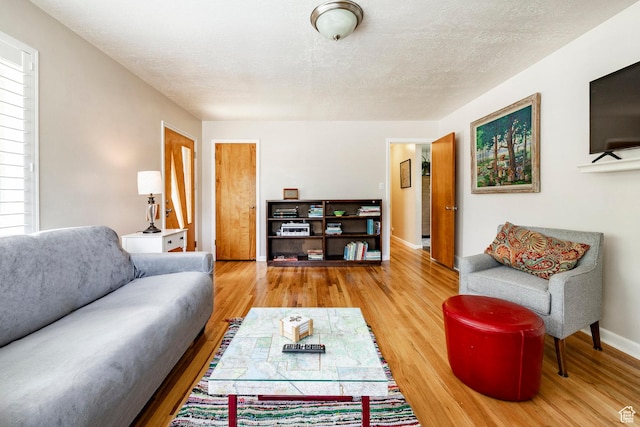 1795 S 50 W, Bountiful, UT 84010 - living room featuring wood finished floors and a textured ceiling