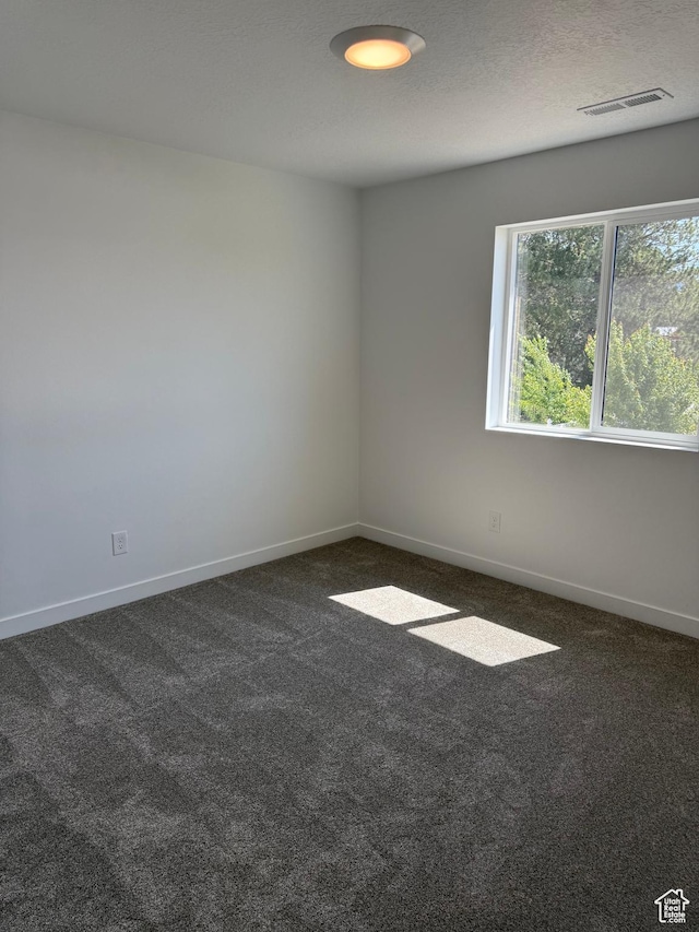 274 N 825 W, Clearfield, UT 84015 - spare room featuring dark colored carpet and baseboards