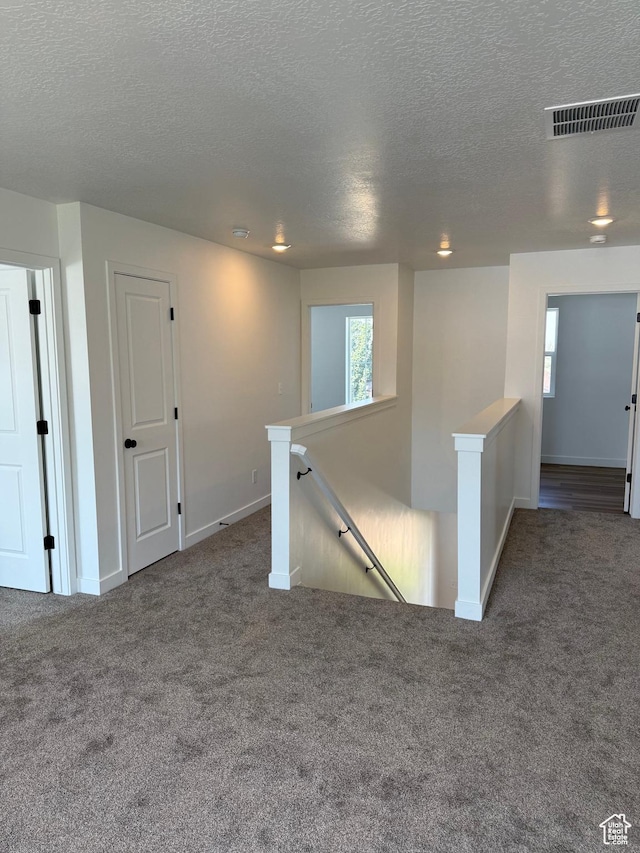274 N 825 W, Clearfield, UT 84015 - empty room with carpet floors and a textured ceiling