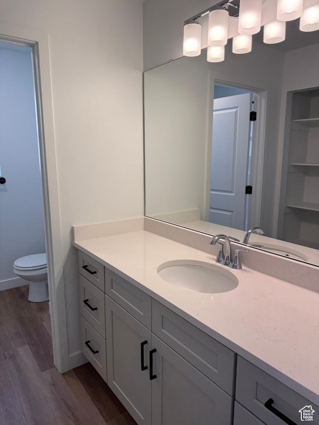 274 N 825 W, Clearfield, UT 84015 - bathroom featuring wood finished floors and vanity