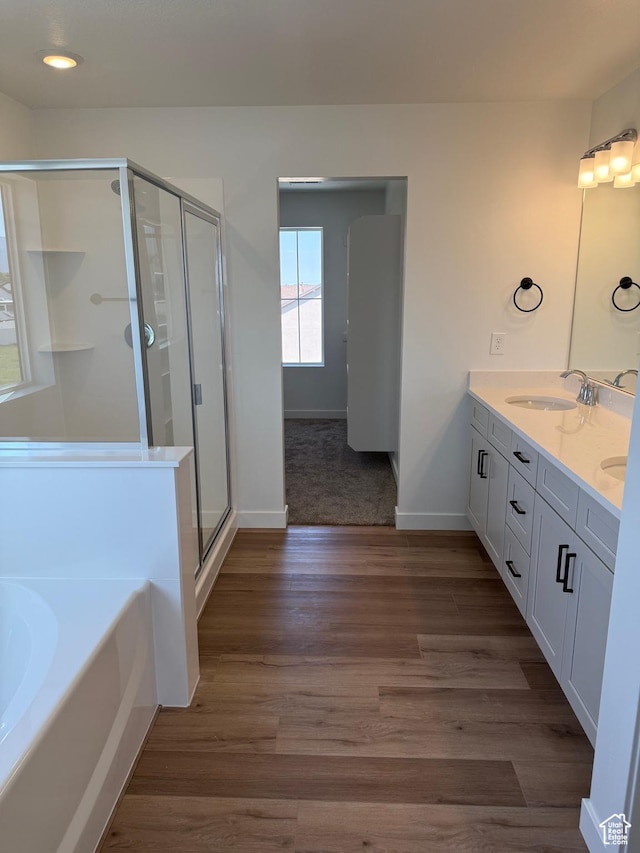 274 N 825 W, Clearfield, UT 84015 - full bathroom featuring double vanity, a garden tub, a shower stall, and wood finished floors